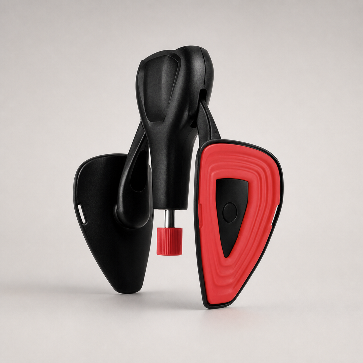 Body-Forge men's black and red resistance trainer on a dark studio background